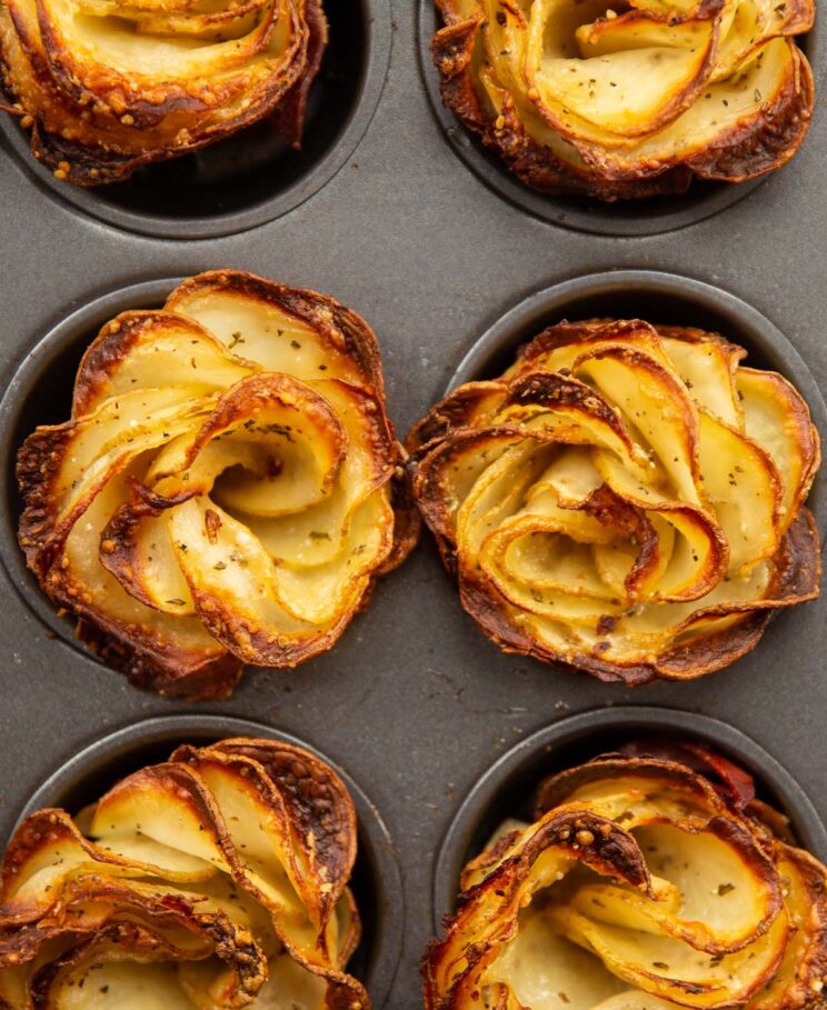 close up overhead shot of potato roses in muffin tray fresh out the oven